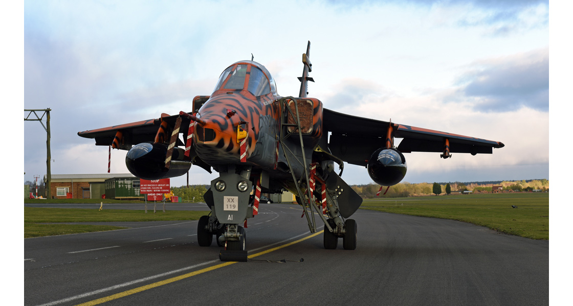 C_Spotty_Sepecat_Jaguar_XX119_leaves_the_RAF_Museum_Cosford_for_a_new_home_with_No_6_Squadron_at_Lossiemouth.jpg