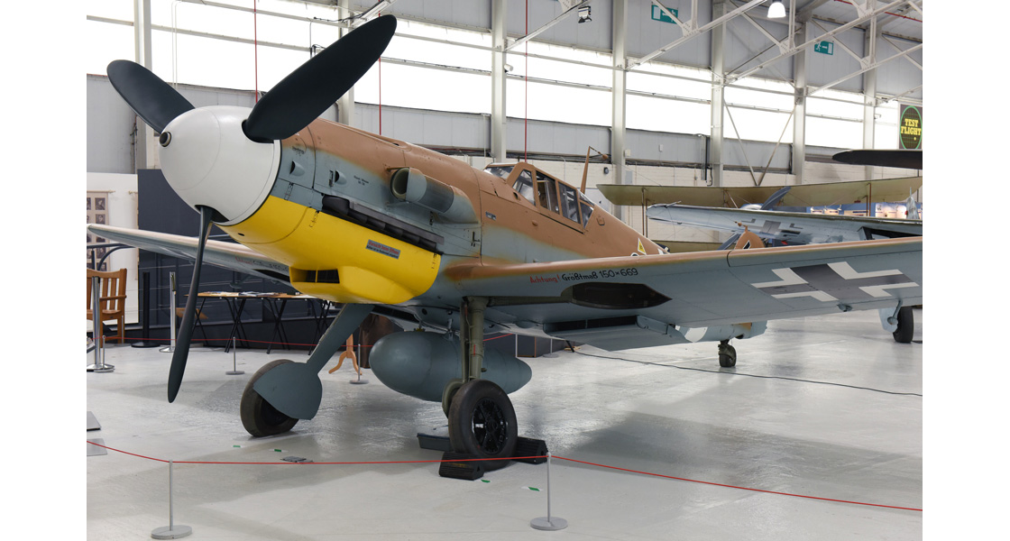 K_The_Airfix_Workbench_blog_marks_the_35th_Anniversary_of_the_first_post_restoration_flight_of_Messerschmitt_Bf109G-2(Trop)_Black6_at_RAF_Benson.jpg
